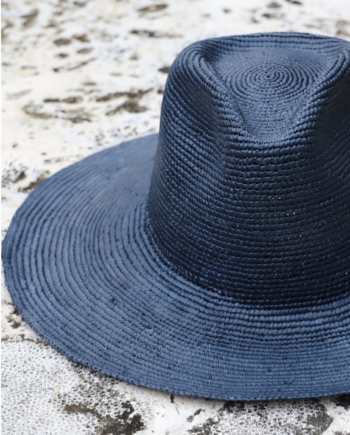Navy blue foldable wide brim panama toquilla straw hat with teardrop crown