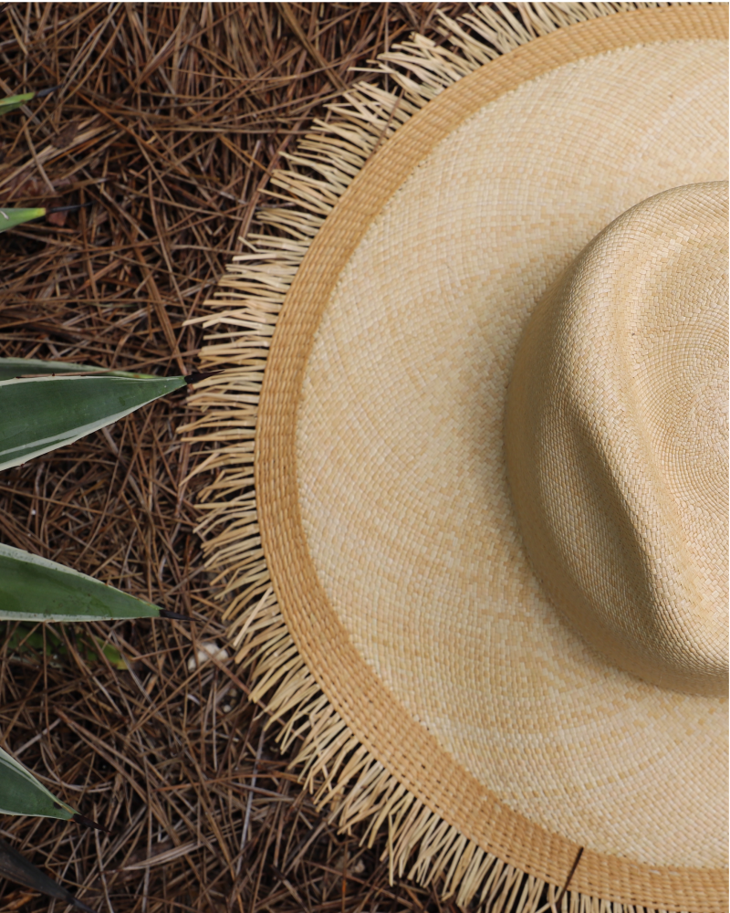 Beige and tan teardrop crown wide brim panama toquilla straw hat with fringe
