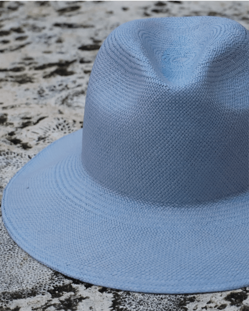 Blue cattleman pinched crown wide brim panama toquilla straw hat